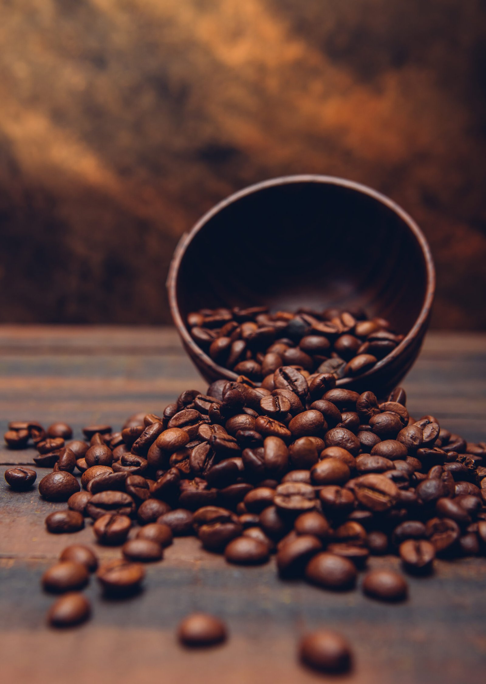 dark coffee beans bowl brown table scaled